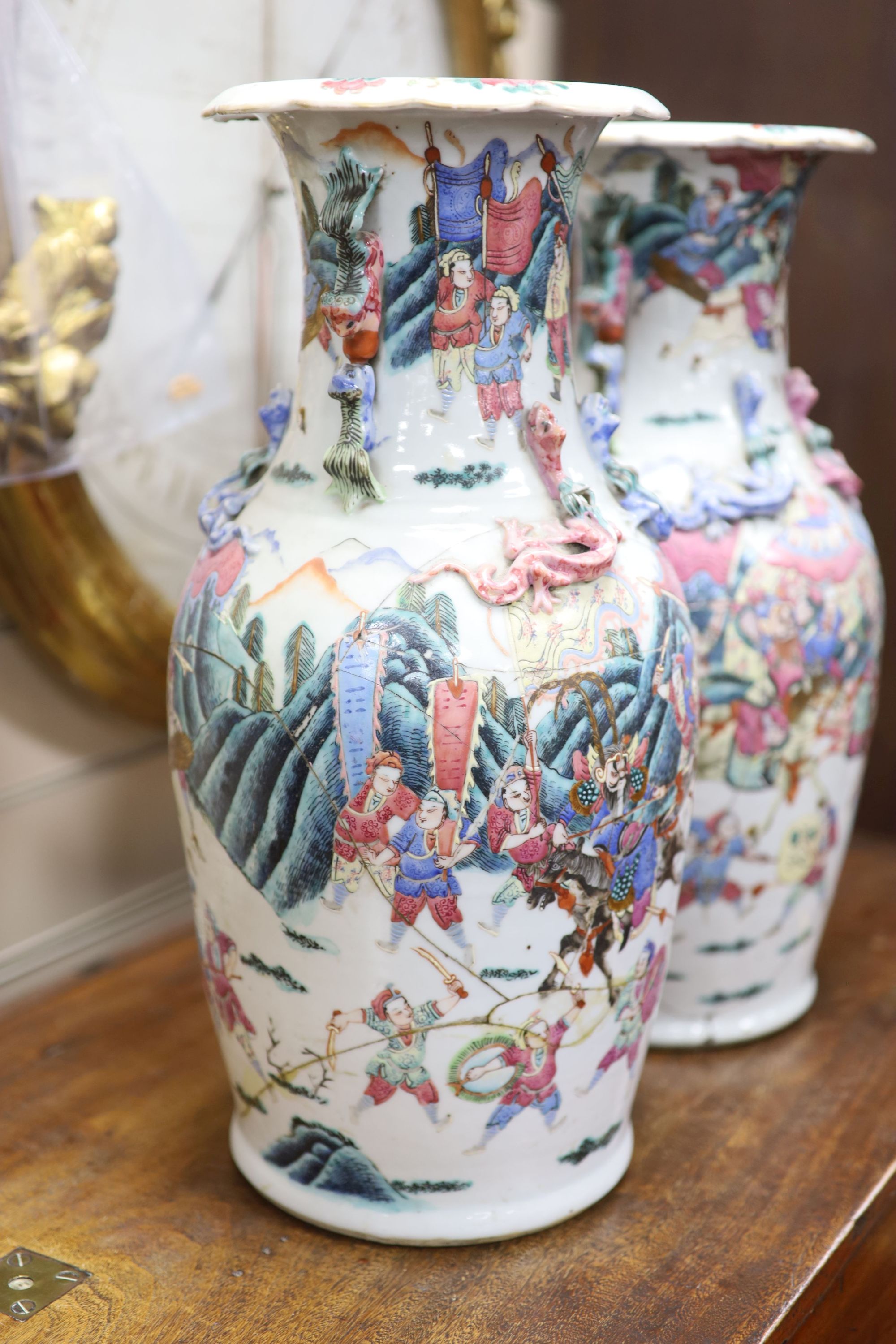 A pair of 19th century Chinese famille rose vases, height 46cm (a.f.)